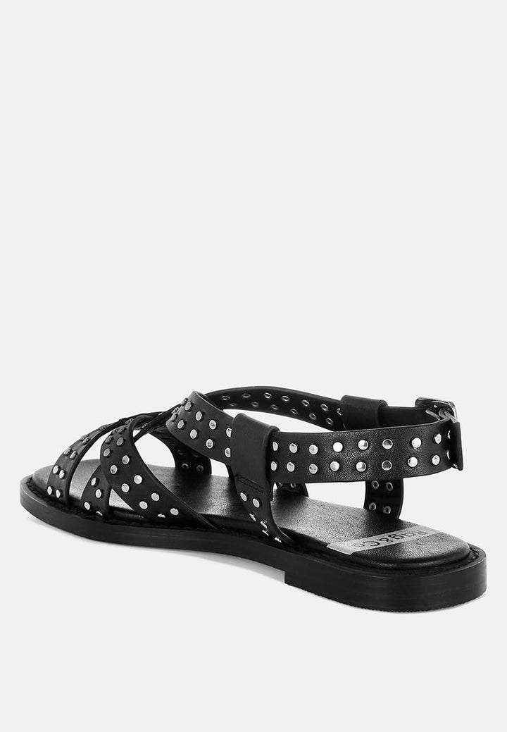 sandalias gladiadoras planas con tachuelas anémona#color_negro
