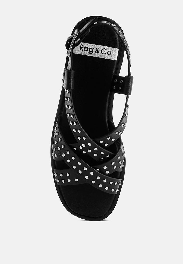 sandalias gladiadoras planas con tachuelas anémona#color_negro