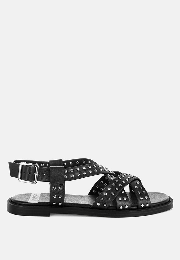 sandalias gladiadoras planas con tachuelas anémona#color_negro