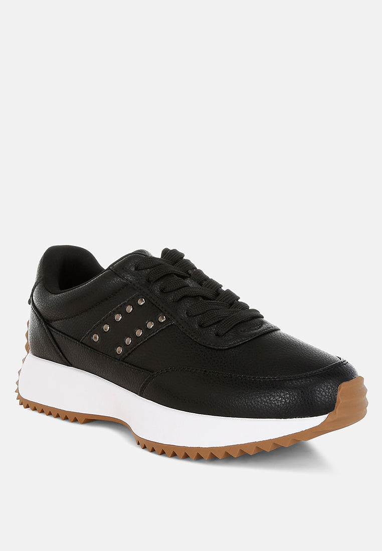 zapatillas de deporte de cuero real con tachuelas athion#color_negro