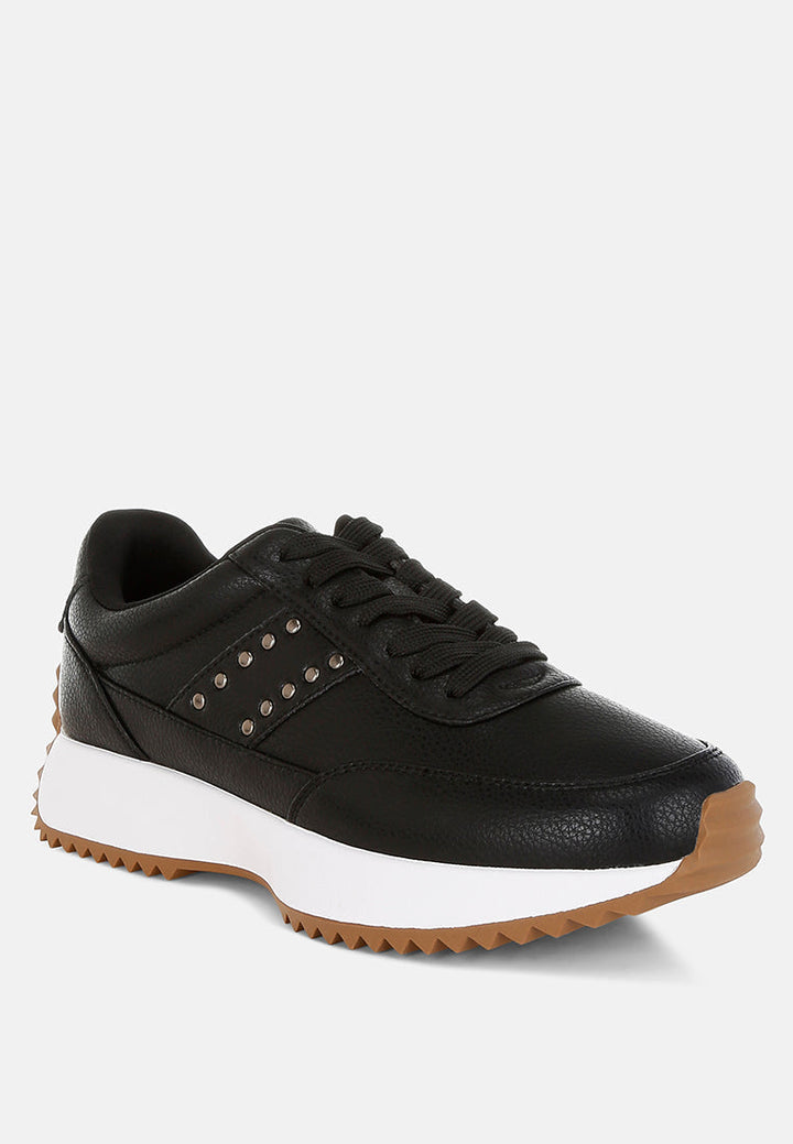 zapatillas de deporte de cuero real con tachuelas athion#color_negro