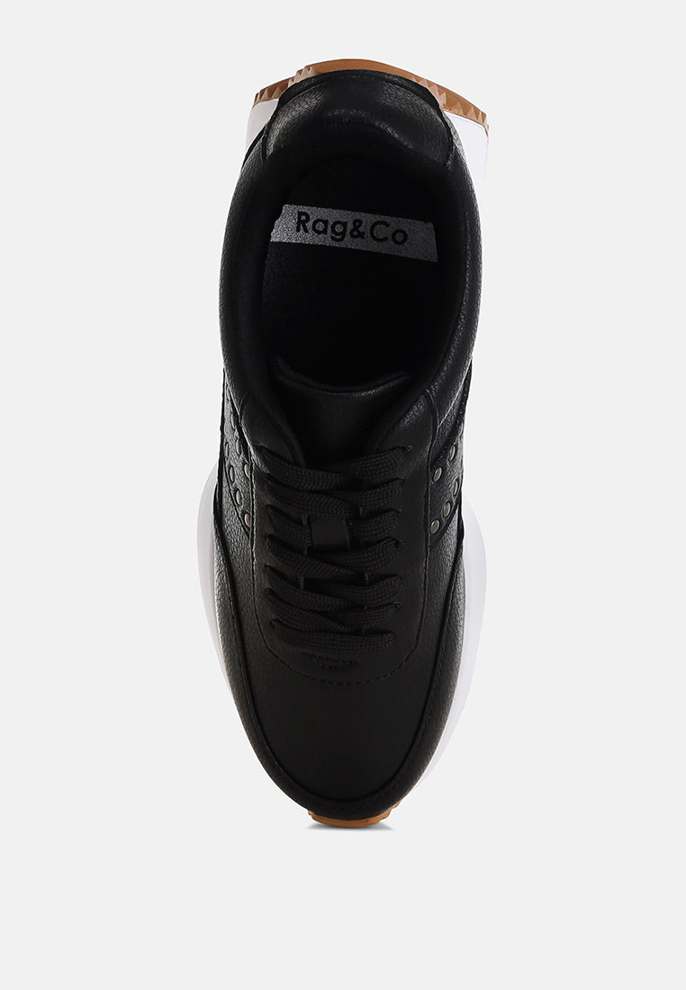 zapatillas de deporte de cuero real con tachuelas athion#color_negro