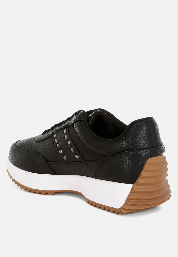 zapatillas de deporte de cuero real con tachuelas athion#color_negro