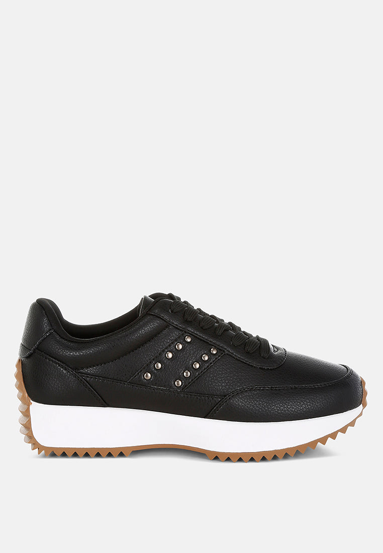 zapatillas de deporte de cuero real con tachuelas athion#color_negro