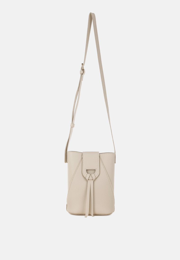 flap closure sling bag by rag#color_off-white