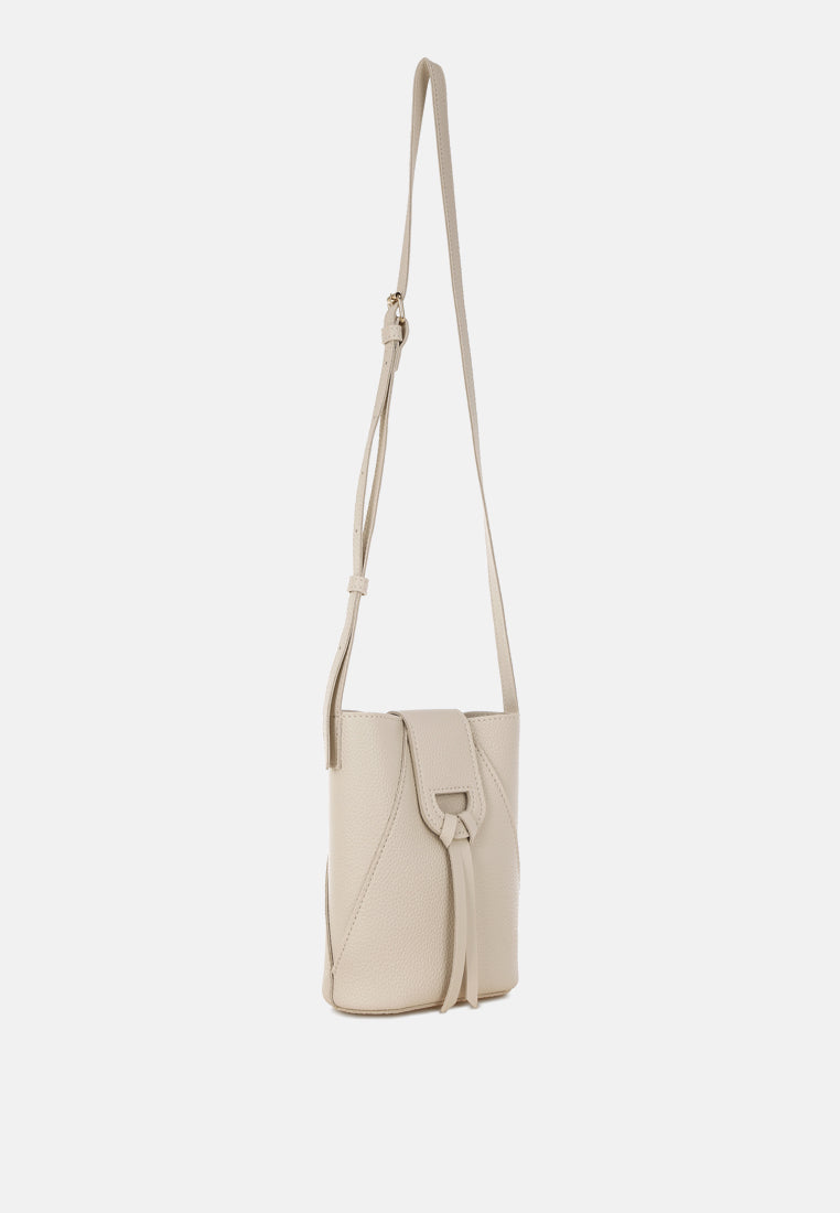 flap closure sling bag by rag#color_off-white