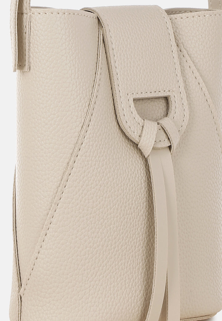 flap closure sling bag by rag#color_off-white