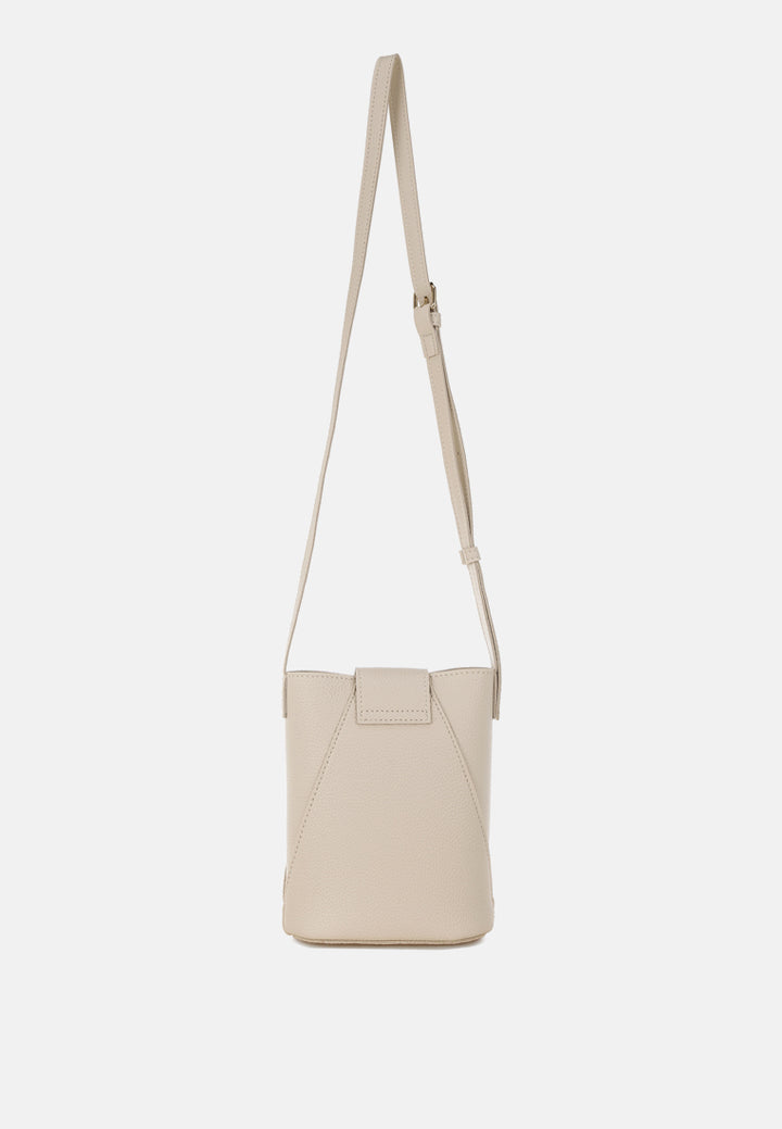 flap closure sling bag by rag#color_off-white