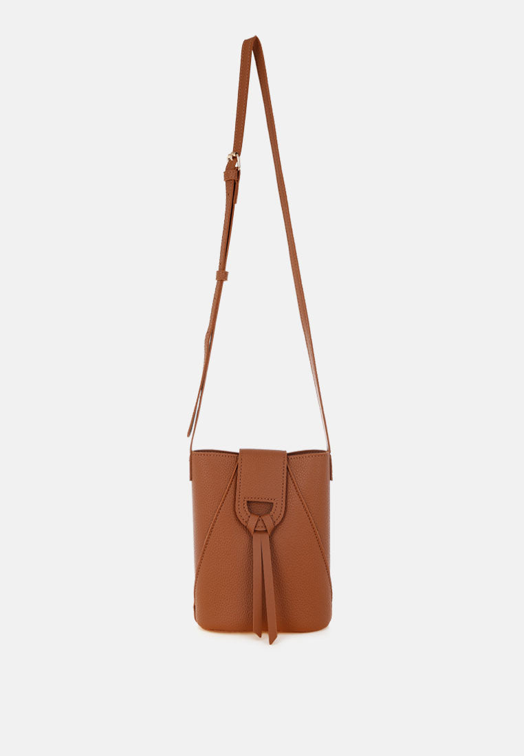 flap closure sling bag by rag#color_tan