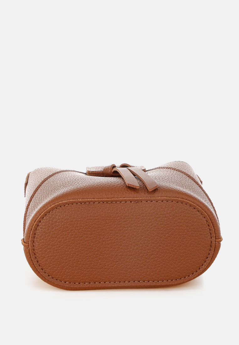 flap closure sling bag by rag#color_tan
