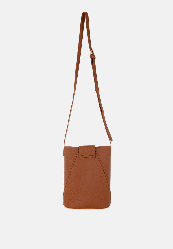 flap closure sling bag by rag#color_tan