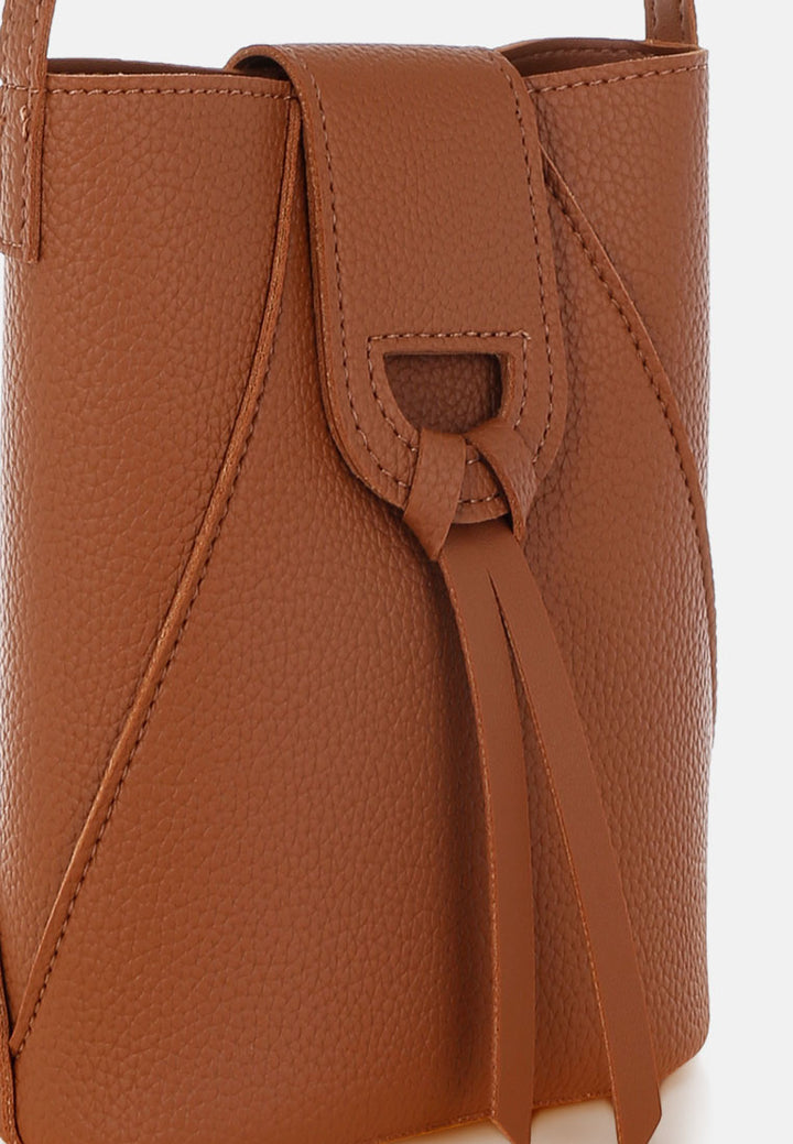 flap closure sling bag by rag#color_tan