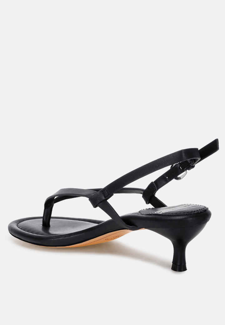 tacones brisbou con tira tipo tanga#color_negro-piel-genuina