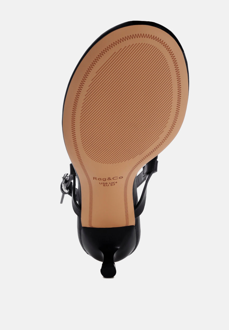 tacones brisbou con tira tipo tanga#color_negro-piel-genuina