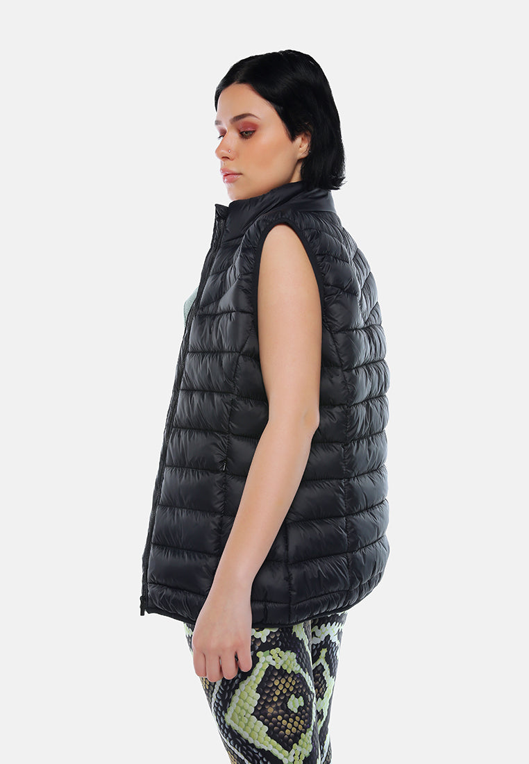 sleeveless puffer jacket in tangerine#color_black