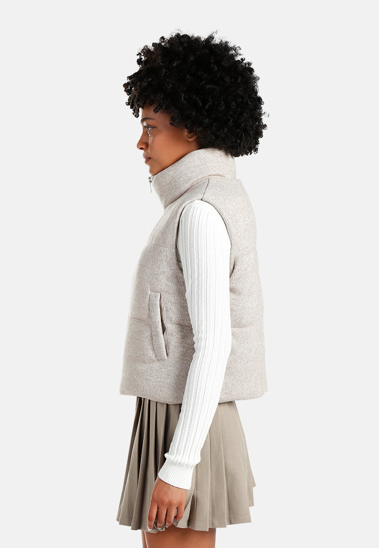 textured high-neck sleeveless jacket#color_stone