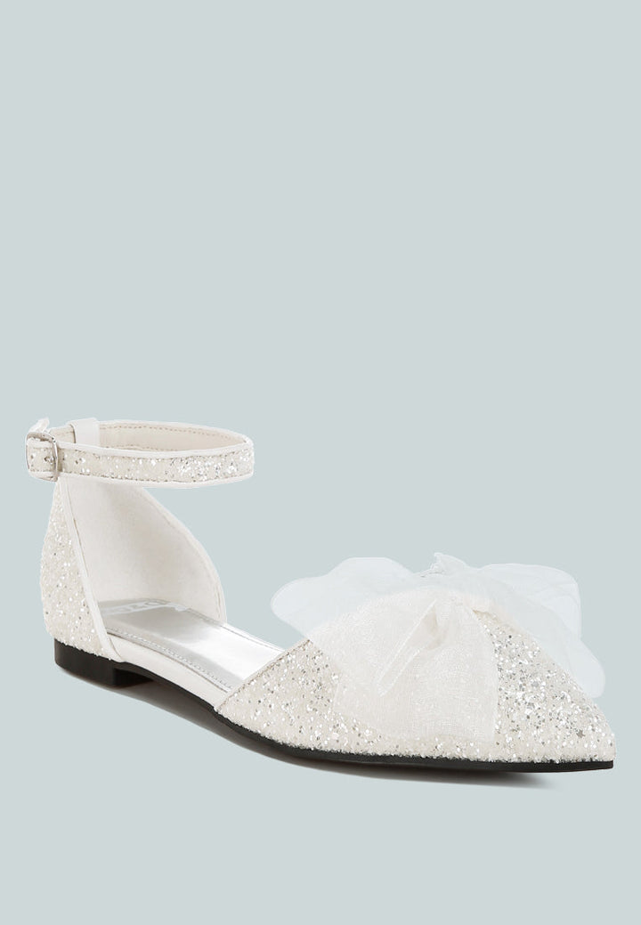Sandalias planas con purpurina y detalle de lazo transparente Clarice#color_white