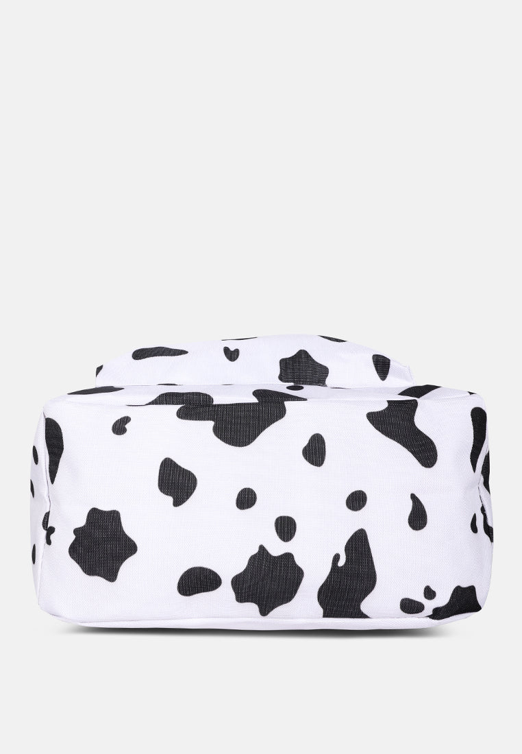 white cow printed casual backpack#color_white