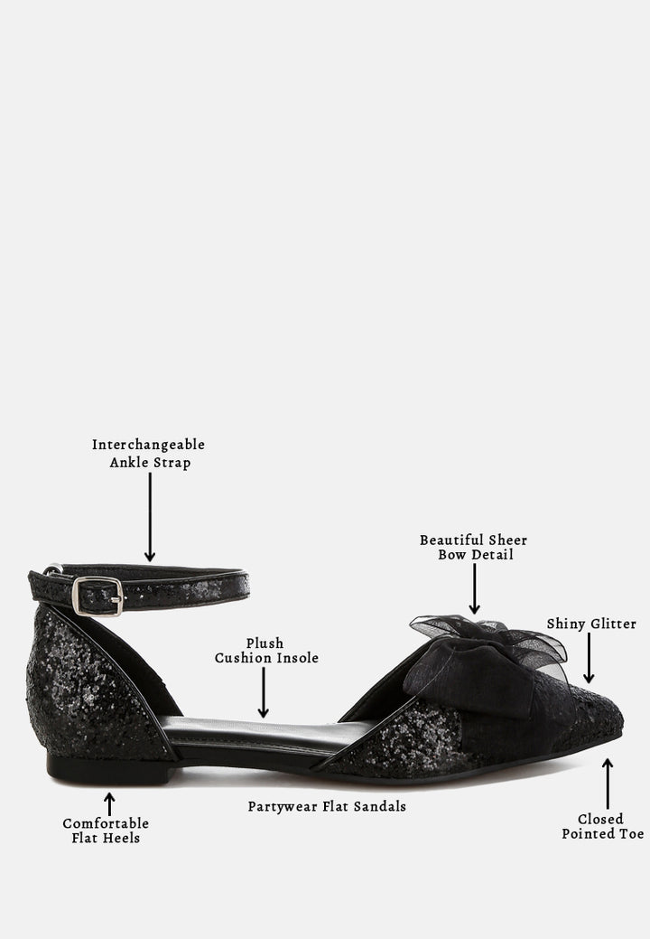 Sandalias planas con purpurina y detalle de lazo transparente Clarice#color_black