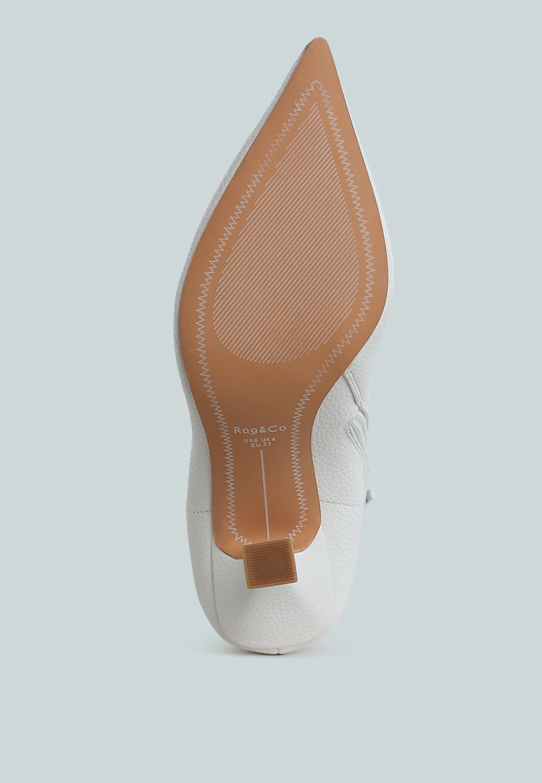botines farnak de piel sintética con punta en punta#color_blanco