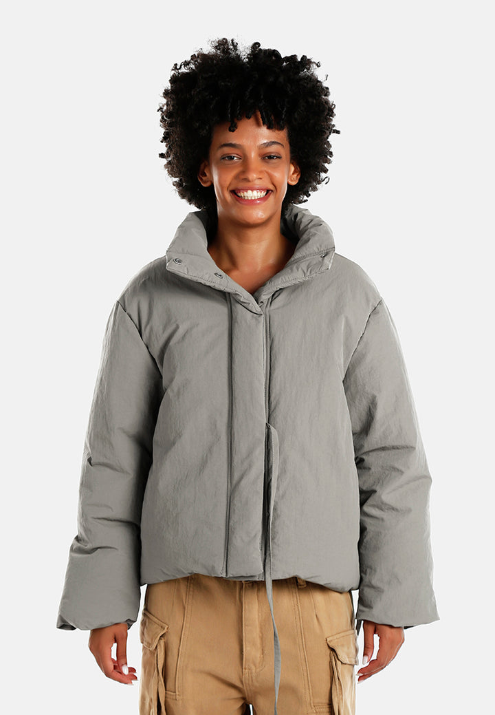 high-neck tie waist quilted jacket#color_taupe