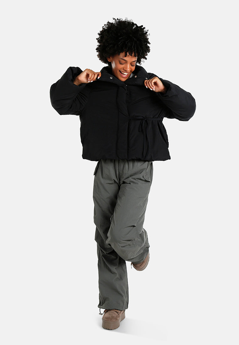 high-neck tie waist quilted jacket#color_black
