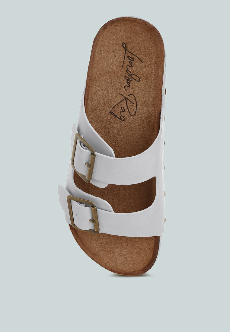 impala studded faux leather slip ons#color_off-white