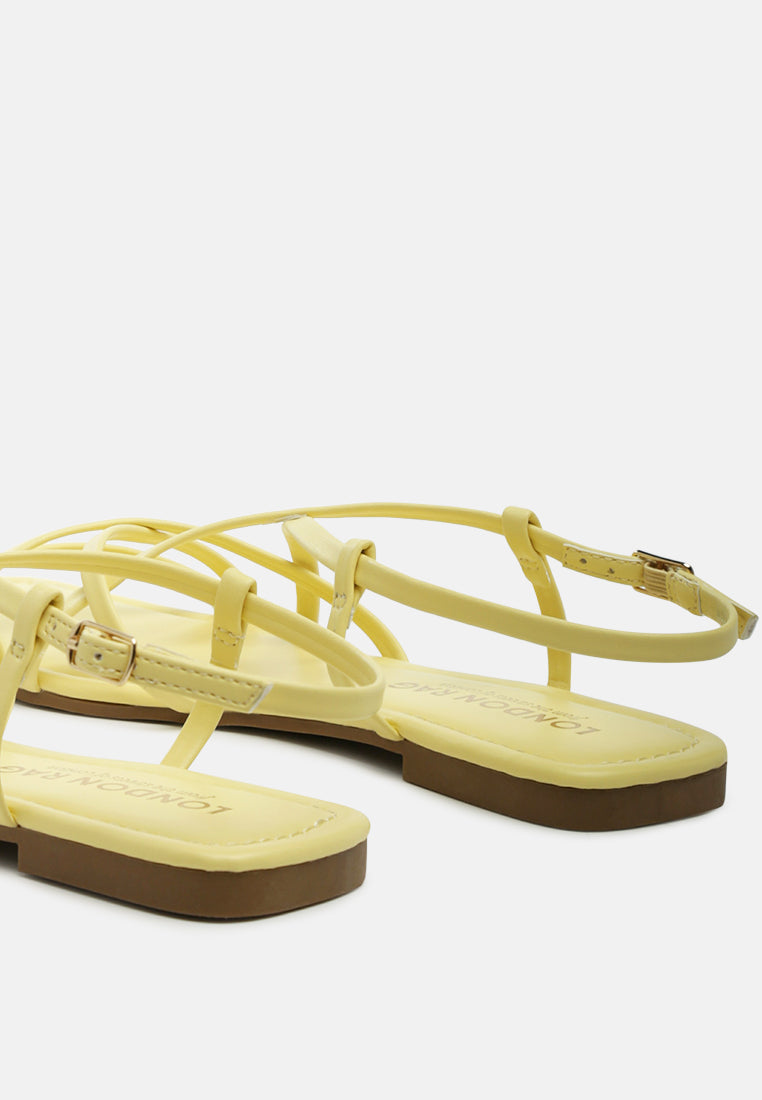 molly cuddles cross strap detail flat sandals#color_yellow
