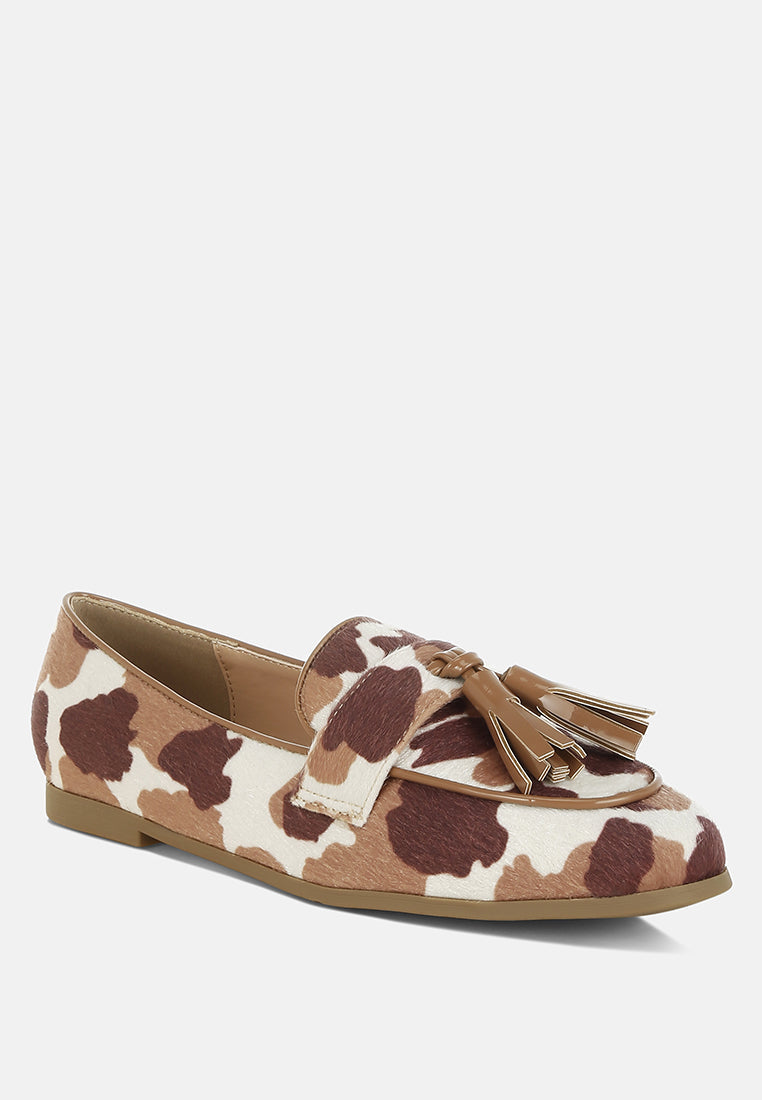 Mocasines moraug de ante sintético con borlas#color_cowprint