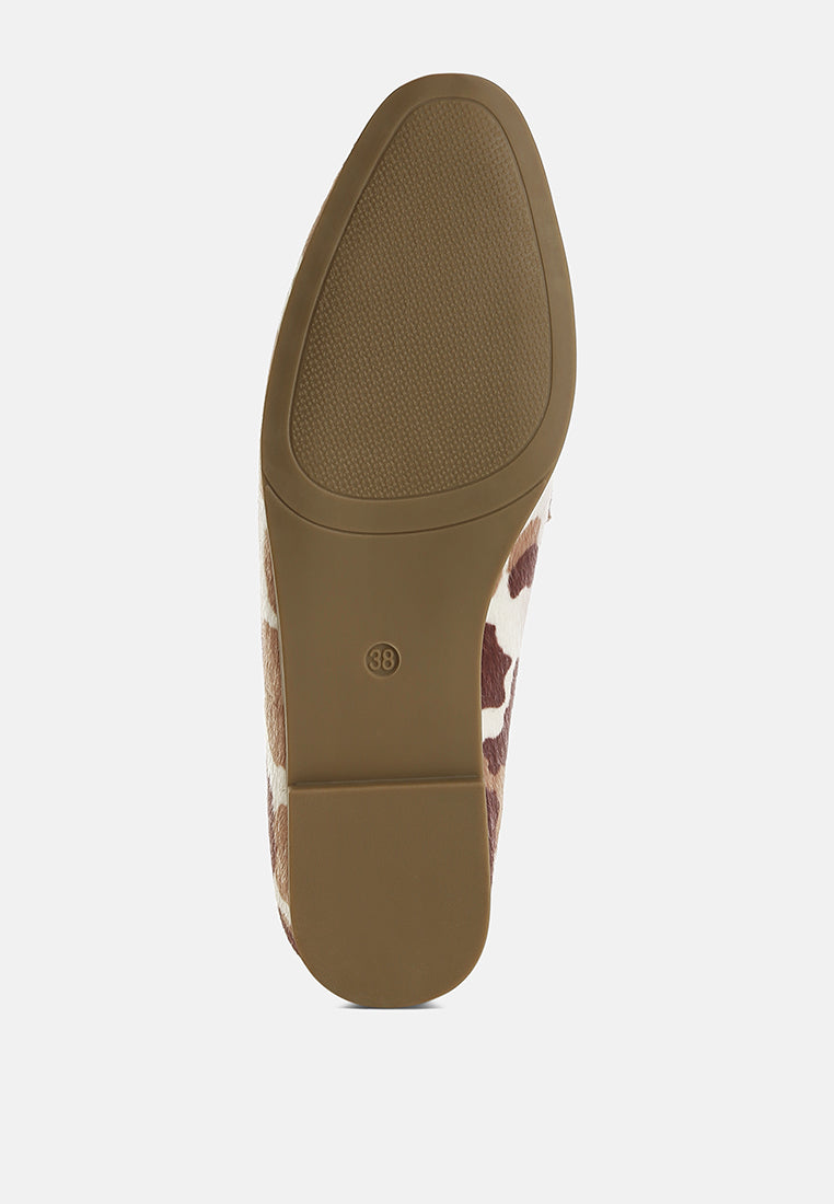 Mocasines moraug de ante sintético con borlas#color_cowprint