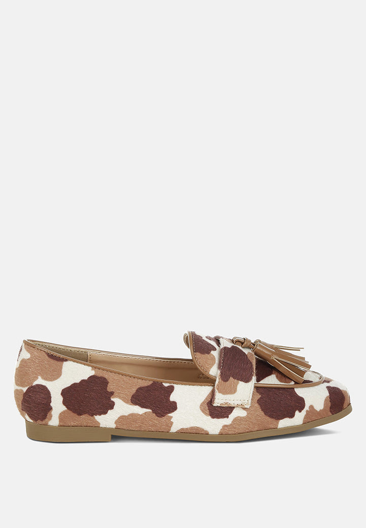 Mocasines moraug de ante sintético con borlas#color_cowprint