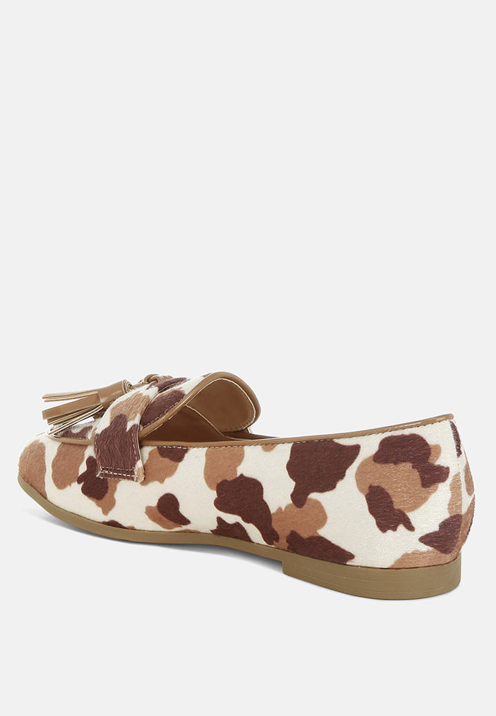 Mocasines moraug de ante sintético con borlas#color_cowprint