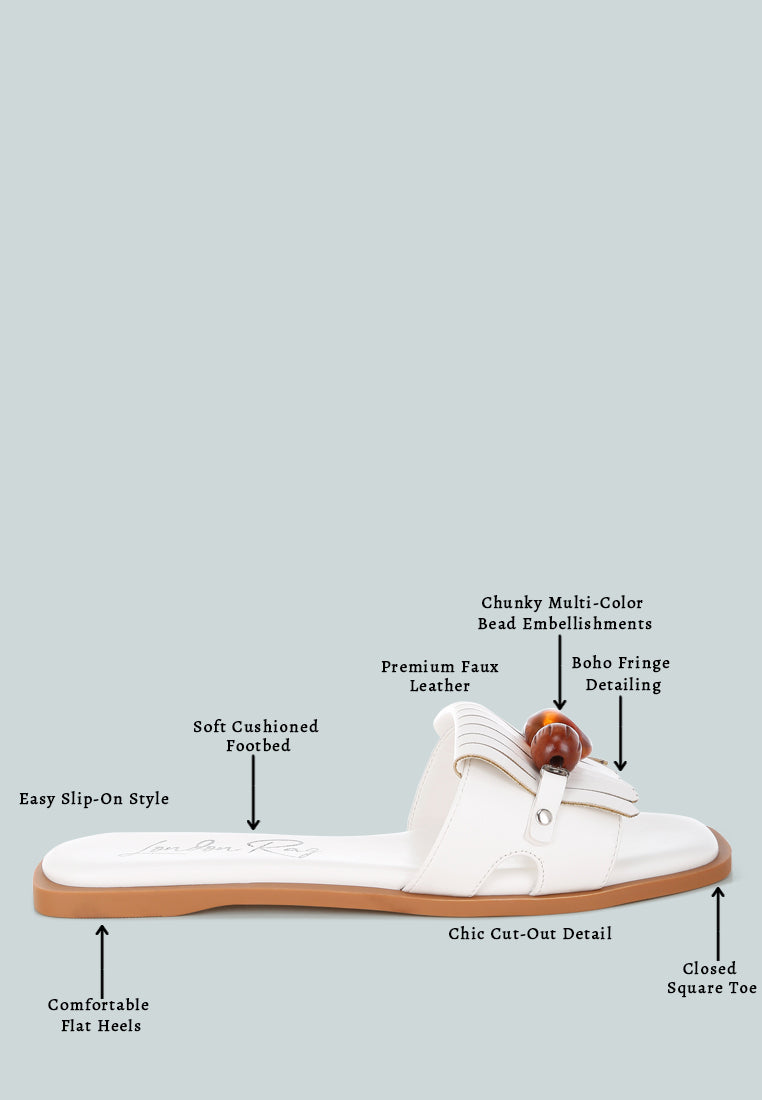 nakasa beaded faux leather slip ons by motes#color_white-faux-leather