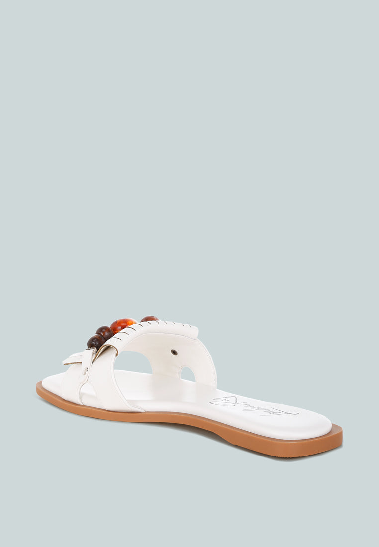 nakasa beaded faux leather slip ons by motes#color_white-faux-leather