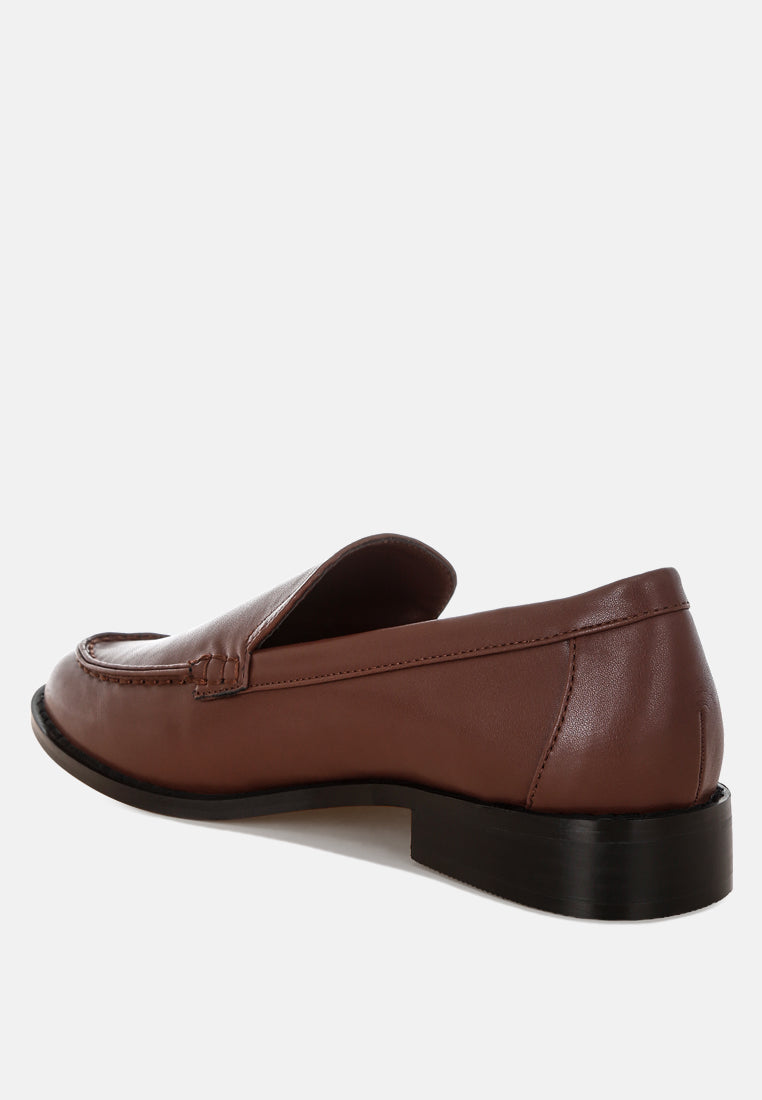 Mocasines ninto de piel con tacón bajo#color_brown