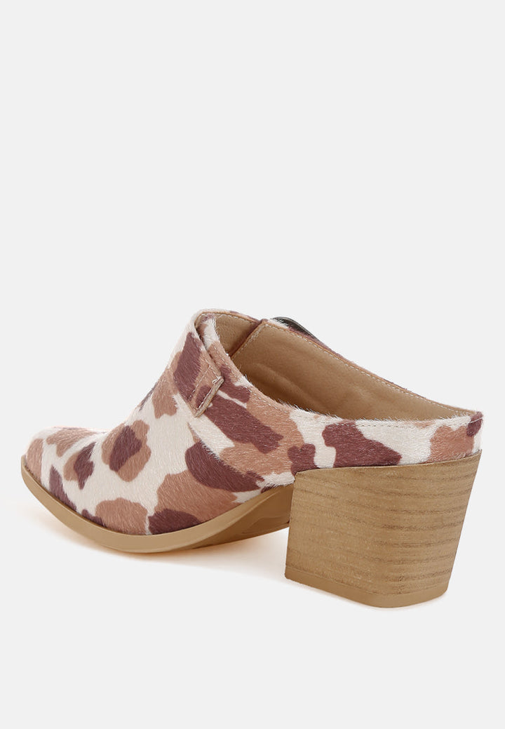 nometa faux suede buckle detail mules#color_cow-print