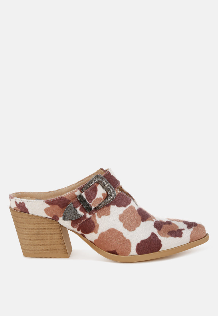 nometa faux suede buckle detail mules#color_cow-print