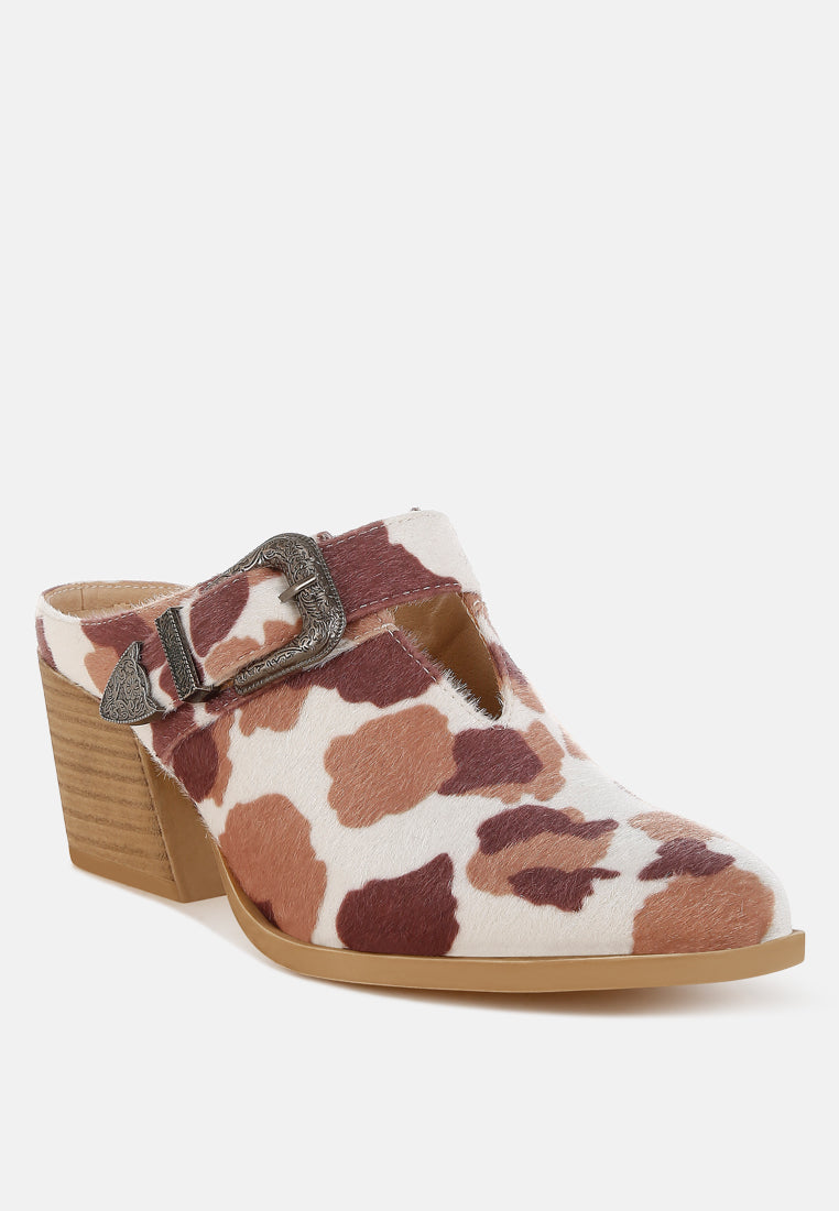 nometa faux suede buckle detail mules#color_cow-print