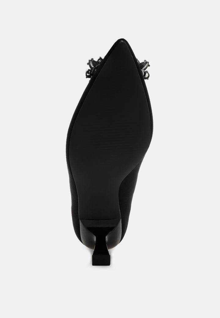 peyton brooch-embellished heel pumps#color_black-suede