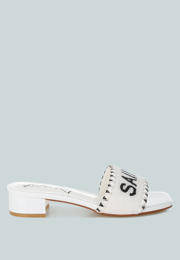 poshta saint tropez beaded slip-on heels by ruw#color_white