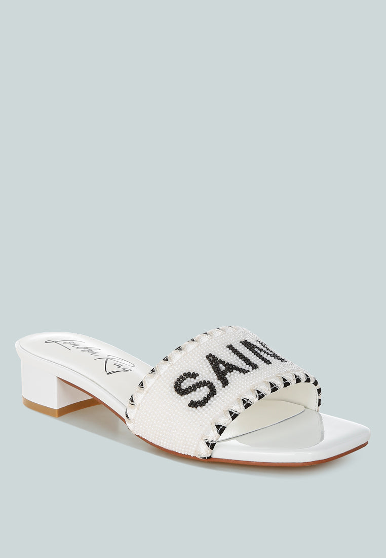 poshta saint tropez beaded slip-on heels by ruw#color_white
