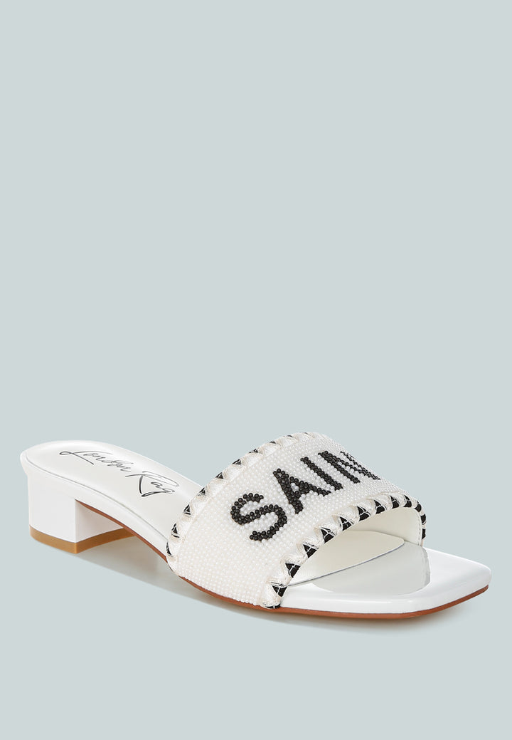 poshta saint tropez beaded slip-on heels by ruw#color_white