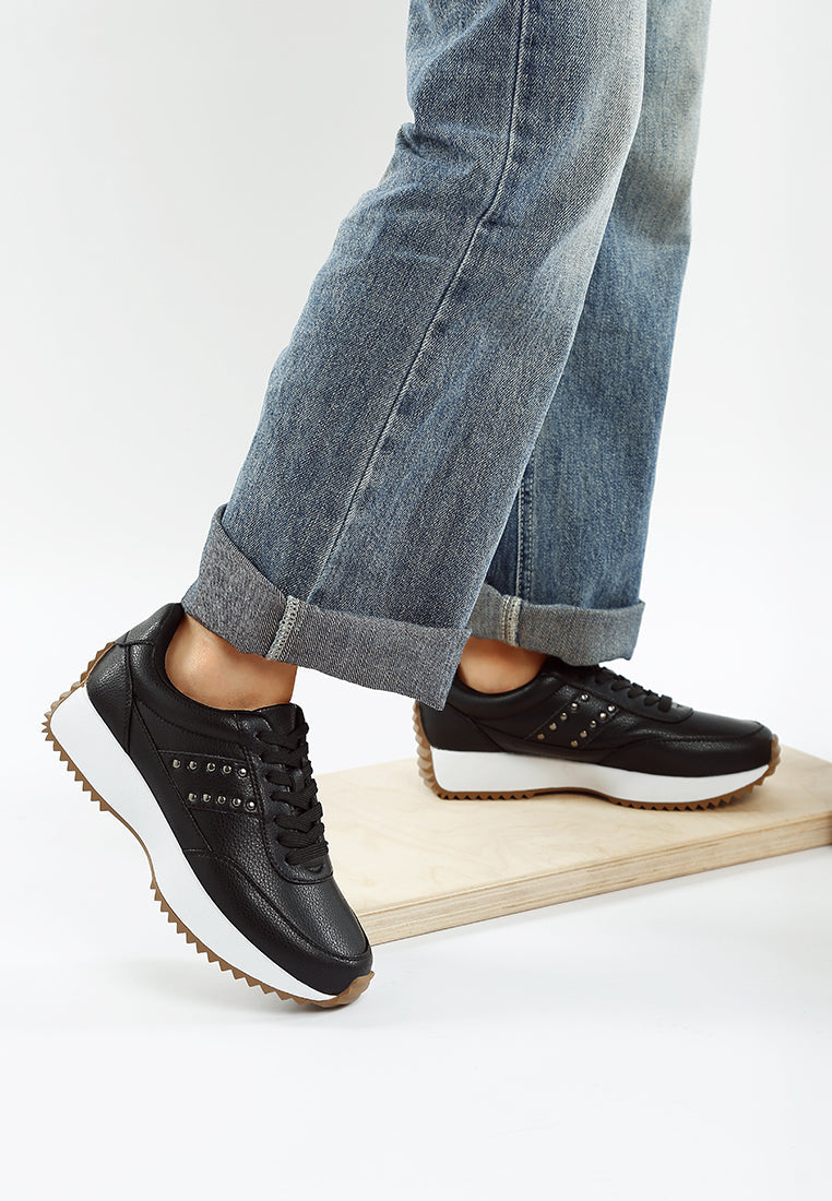 zapatillas de deporte de cuero real con tachuelas athion#color_negro