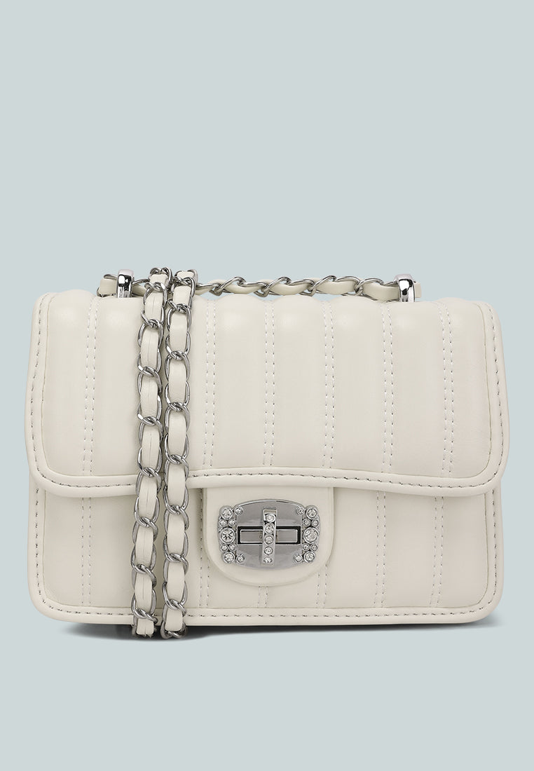 rhinestone embellished lock flap bag#color_off-white