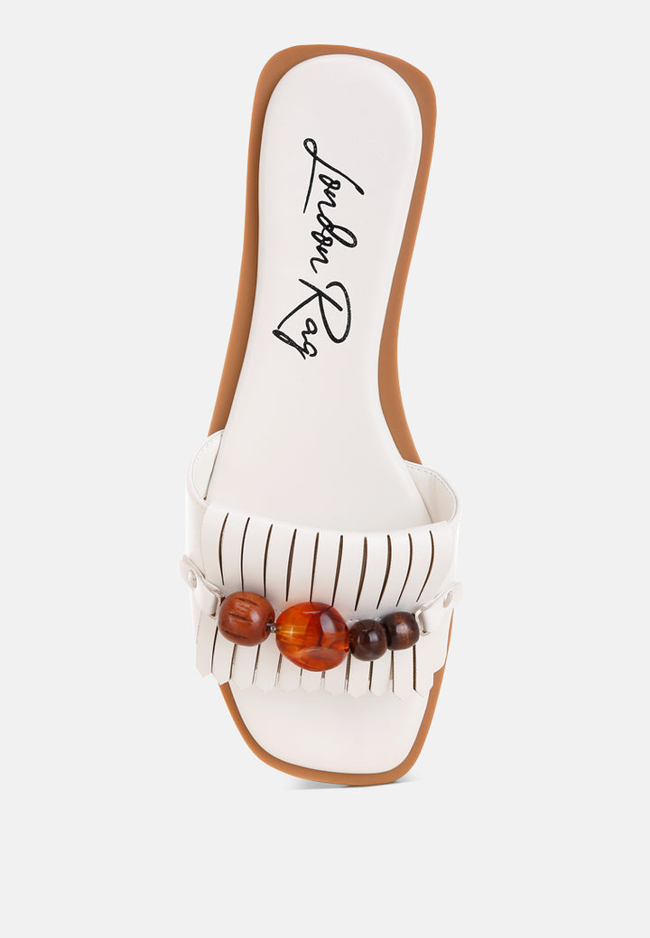 nakasa beaded faux leather slip ons by ft#color_white