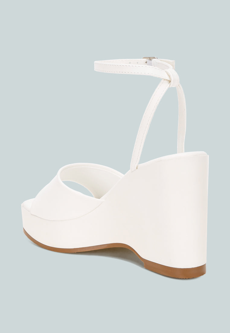 sangria solid platform faux leather wedges by ft#color_white