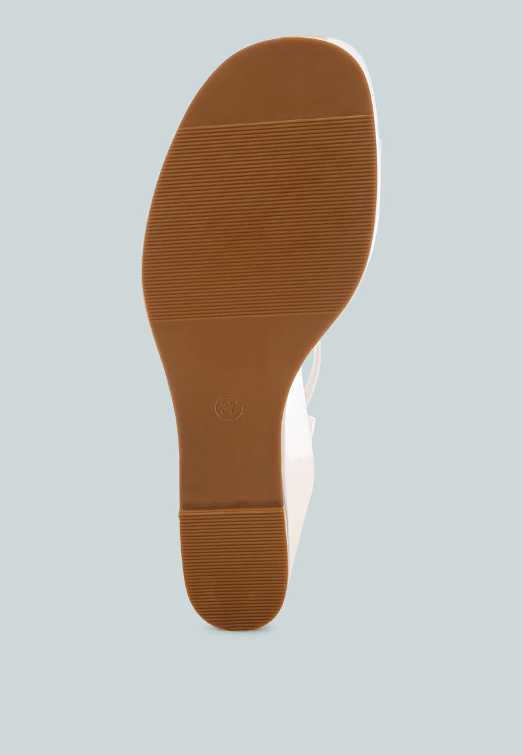sangria solid platform faux leather wedges by ft#color_white