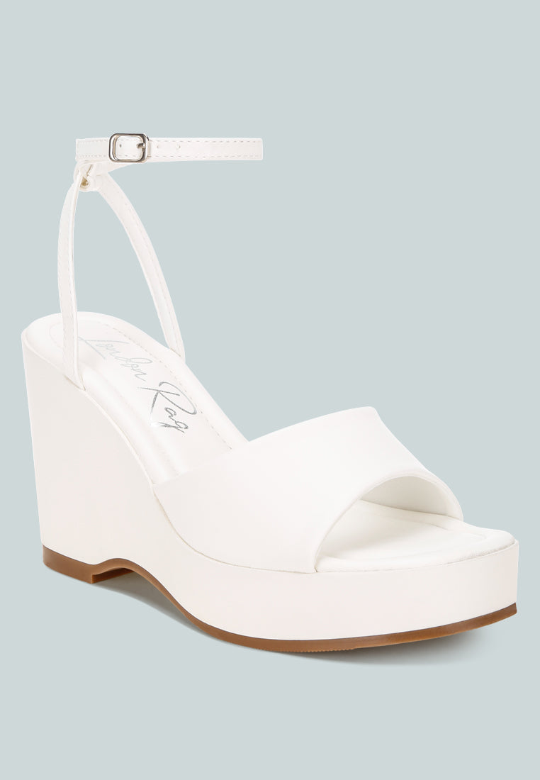 sangria solid platform faux leather wedges by ft#color_white