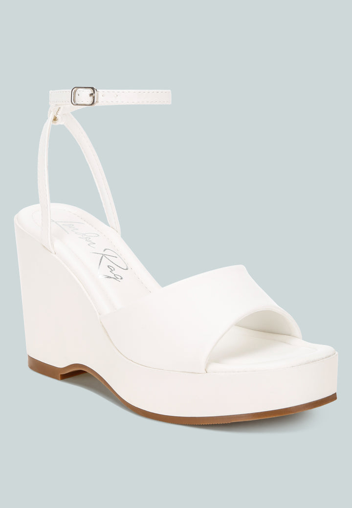 sangria solid platform faux leather wedges by ft#color_white