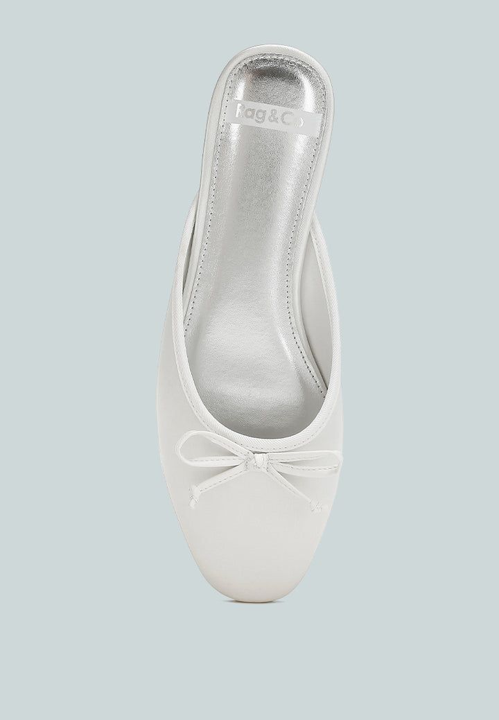 mules taylena con detalle de lazo de satén#color_white
